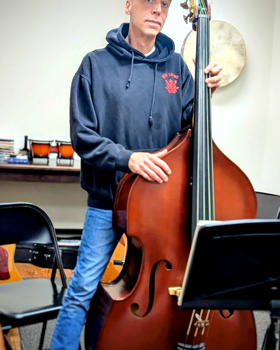 Portrait with upright bass in the studio